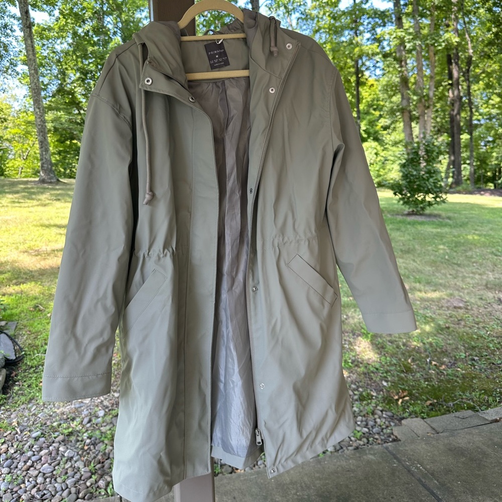 Very cute light green raincoat